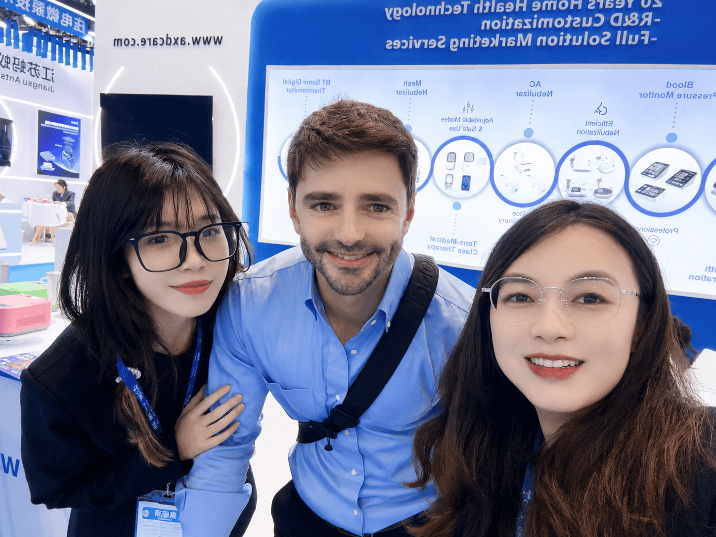 AXDCARE team meeting an international customer at a medical exhibition
