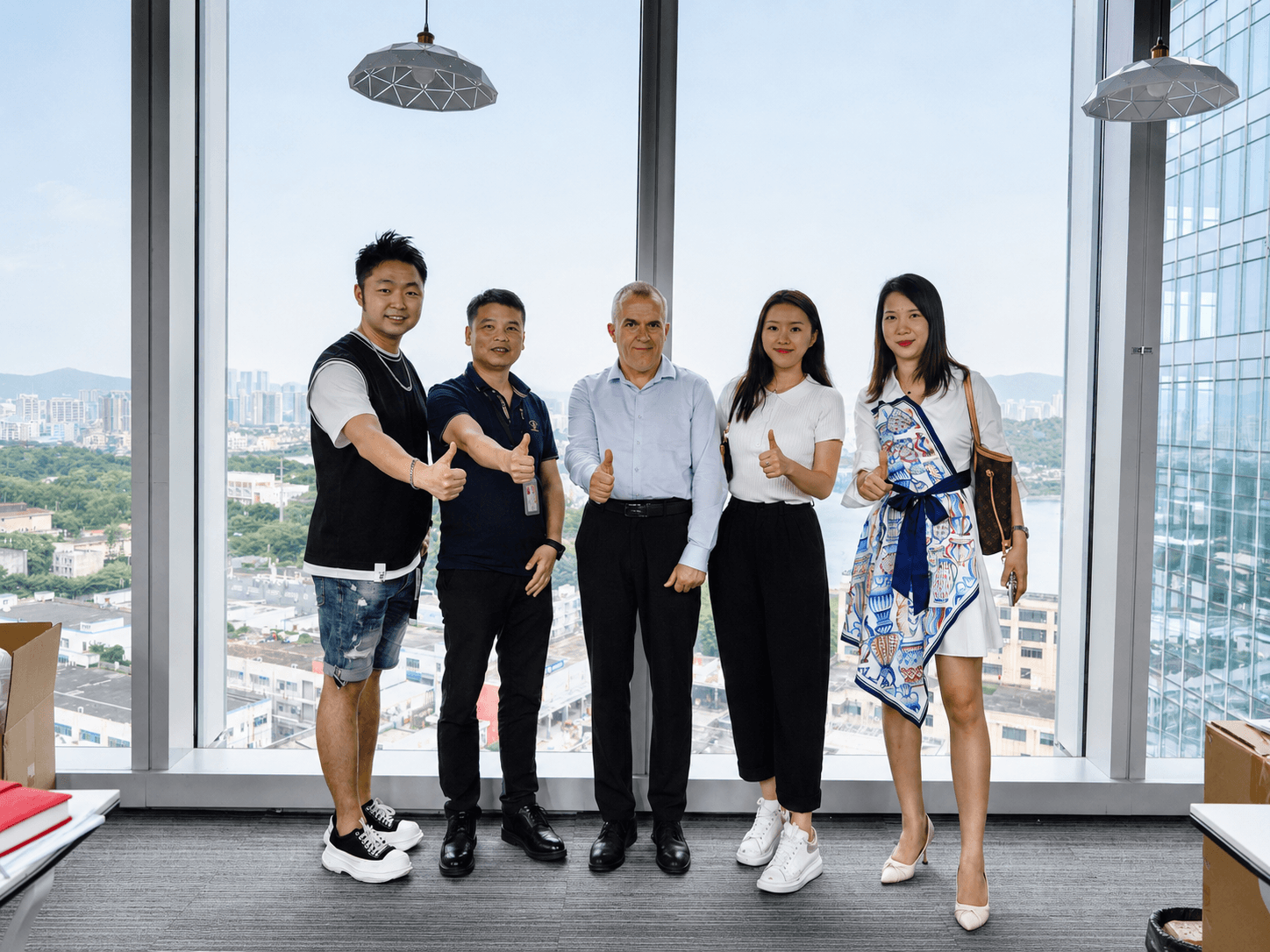 AXDCARE team and international customer visiting the Shenzhen office